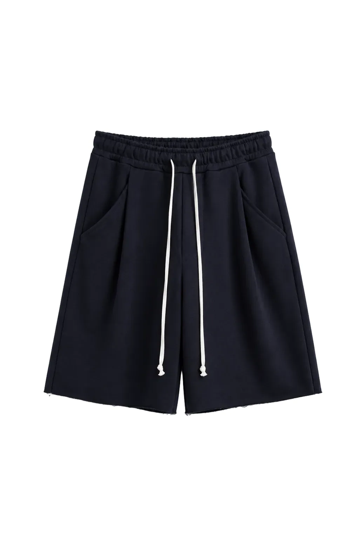 Pantaloni bleumarin oversized cu șnur lung în talie, având o cusătură decorativă frontală pe centrul piciorului, confecționaț